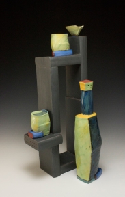 Toddy Tower, 2014, 22”h x 9.5”w x 4”d Hand built cone 3 red clay and cast cone 03 earthenware, terra sigillata, underglaze, and glaze. Electric Fired.